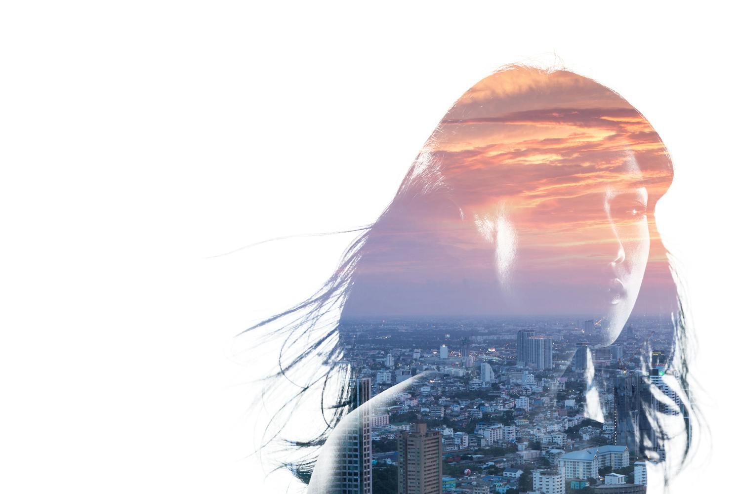 Päällekkäisvalotus: nainen ja kaupunkimaisema